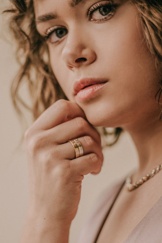 "Liquid Metal" 14K Gold narrow Hammered Band with Diamond