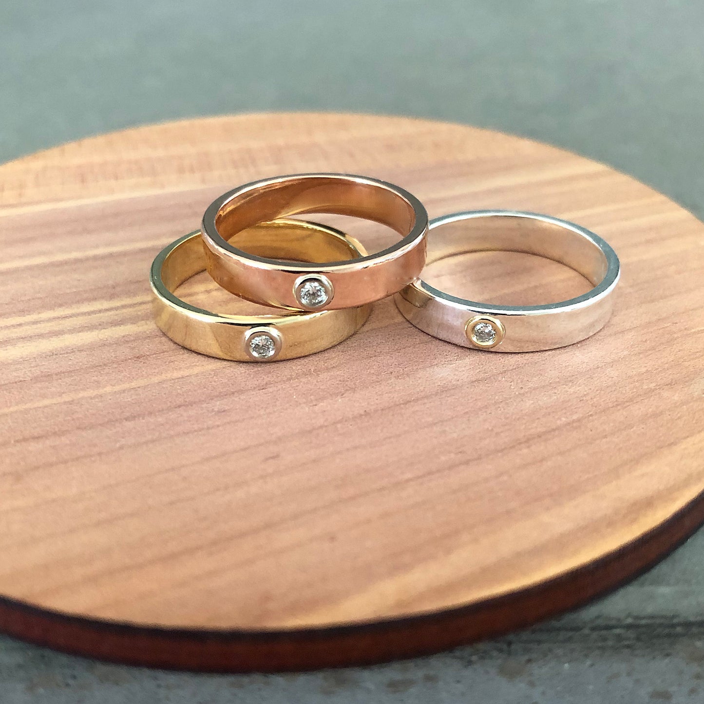 "Liquid Metal" 14K Gold narrow Hammered Band with Diamond